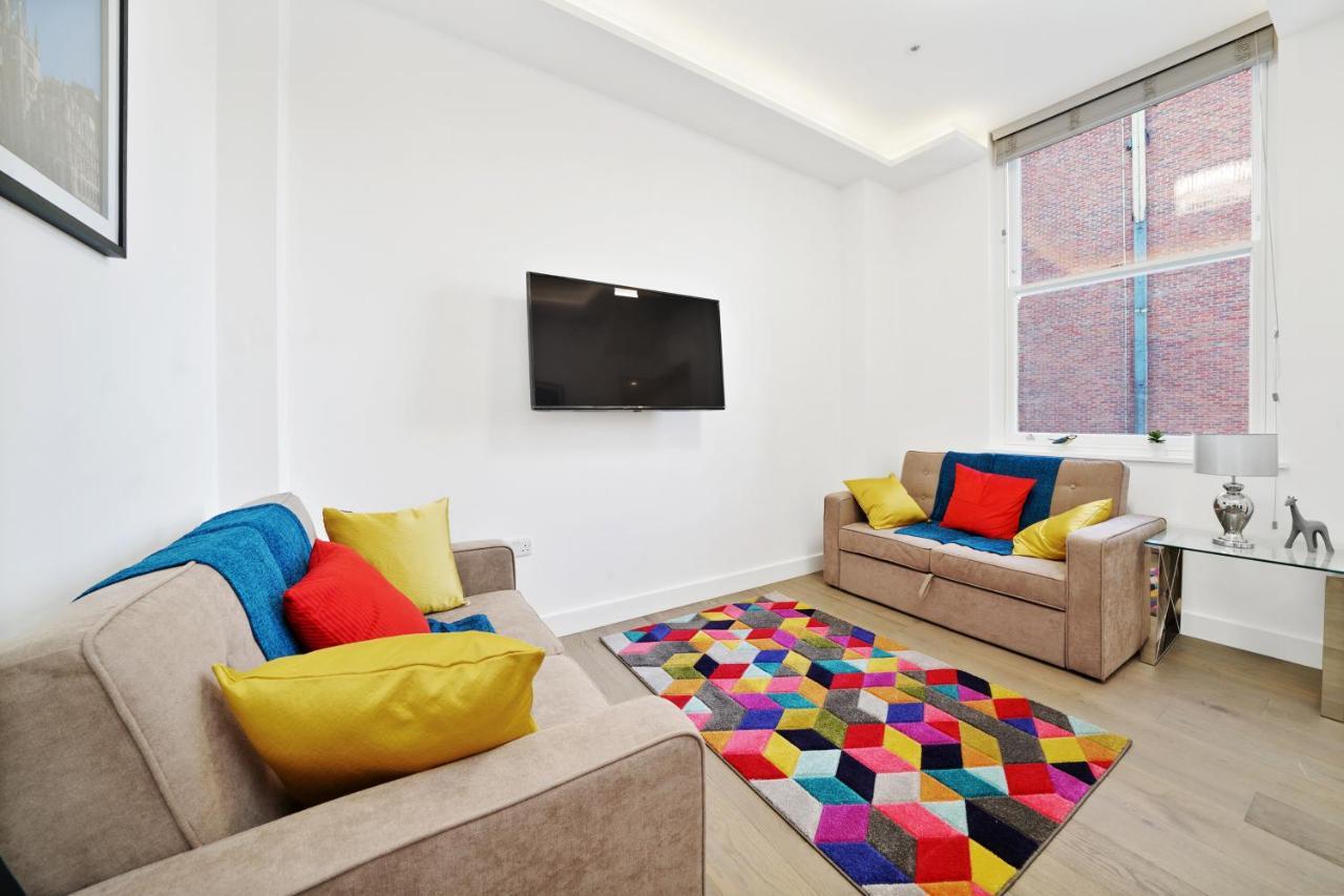 City Prime Apartments Лондон Екстериор снимка A living room in a serviced apartment in London